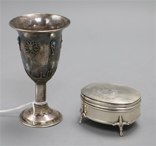 A George V silver trinket box, engraved Womens Suffrage and a white metal and turquoise set Khiddush cup.